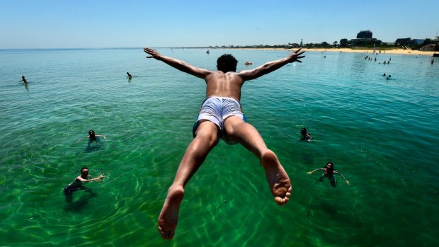 Get set to swelter, or find a way to cool off - like this young man at the Frankston Jetty.