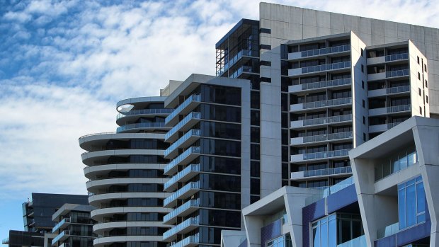 JP Morgan has warned of settlement difficulties for local buyers of high-rise apartments being built in Melbourne and Brisbane.