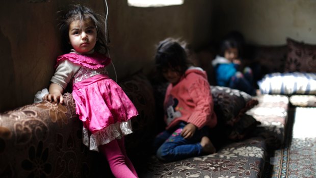 "Nothing is permanent except the temporary": Syrian refugees in their tent at al-Marj.