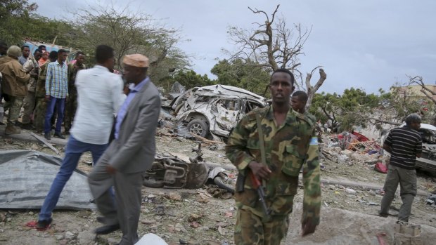 Security forces secure the scene of a suicide car bomb attack in Somalia's capital Mogadishu on Sunday. 