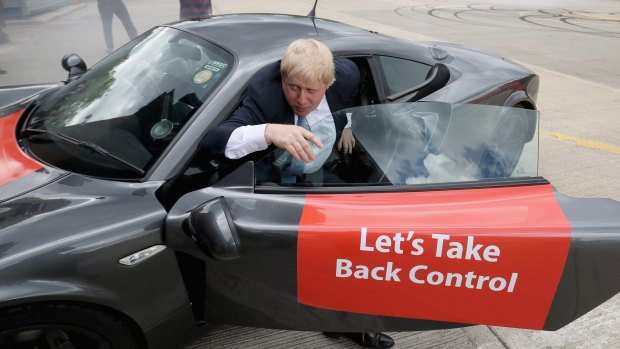 Boris Johnson MP emerges from a sports car in Yorkshire after it performed 'donuts'.