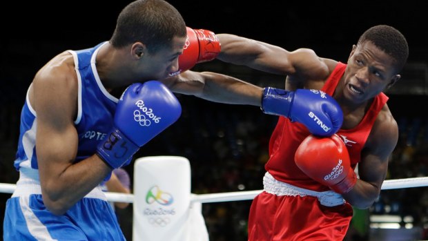 Namibia's Junias Jonas, right, fights France's Hassan Amzile.