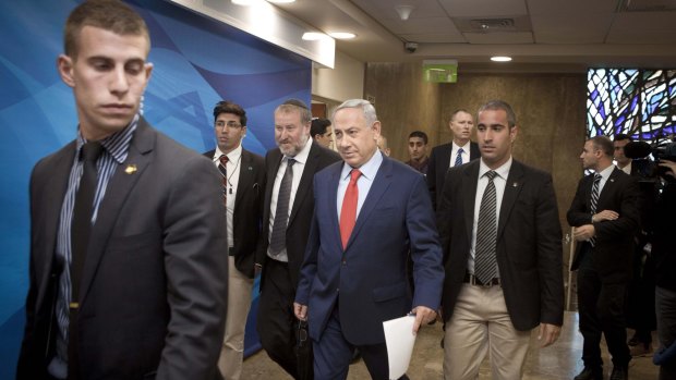 Israeli Prime Minister Benjamin Netanyahu arrives for the weekly cabinet meeting in Jerusalem on Sunday. 