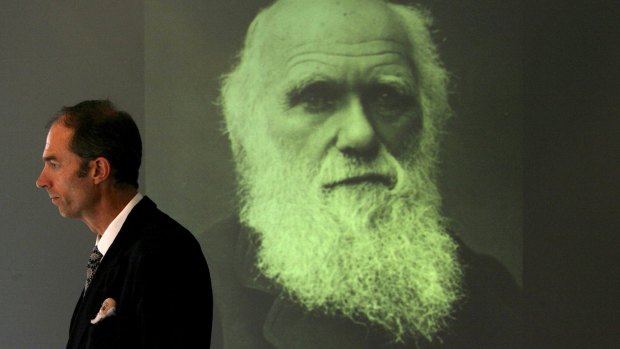 Chris Darwin, Charles Darwin's great great grandson with a portrait of Charles Darwin in 2003.