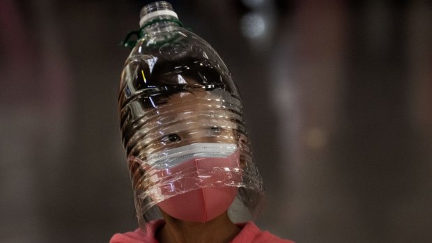Wearing a mask can help prevent the spread of viruses. Plastic bottles ... not so much.