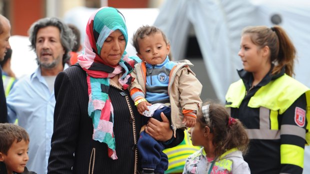 Migrant and refugees arriving in Germany on Tuesday.