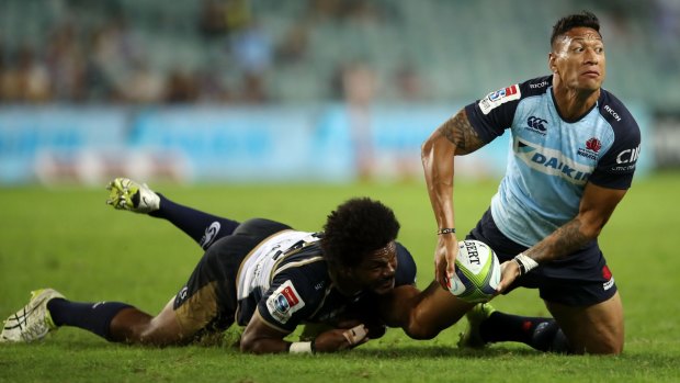 Unlucky 13?: Israel Folau is dragged down by Henry Speight.