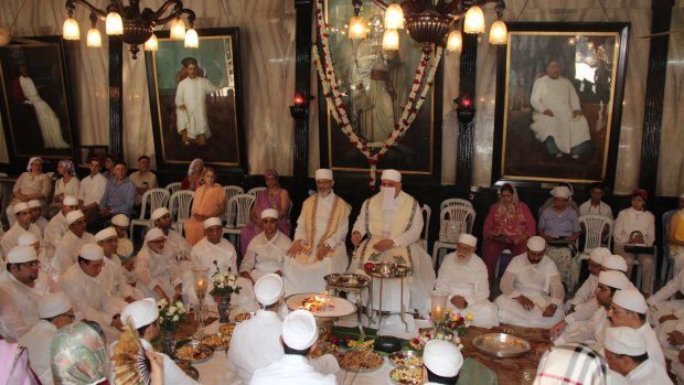 Parsi priests perform the Jashan (thanksgiving) ceremony in Mumbai.  