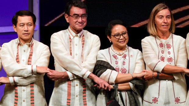 From left, Laos' Foreign Minister Saleumxay Kommasith, Japan's Foreign Minister Taro Kono, Indonesia's Foreign Minister Retno Marsudi and EU Foreign Policy Chief Federica Mogherini.