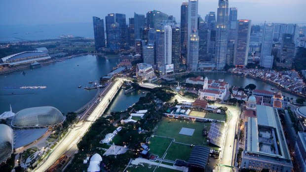 The Singapore F1 Grand Prix's Marina Bay City Circuit lit at dusk.
