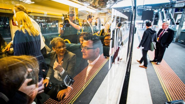 Premier Daniel Andrews and Public Transport Minister Jacinta Allan aboard a V/Line service at a launch for the Regional Rail Link. 