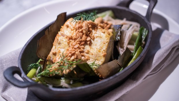 Cha ca la vong, turmeric-marinated kingfish with herbs and bun noodles.