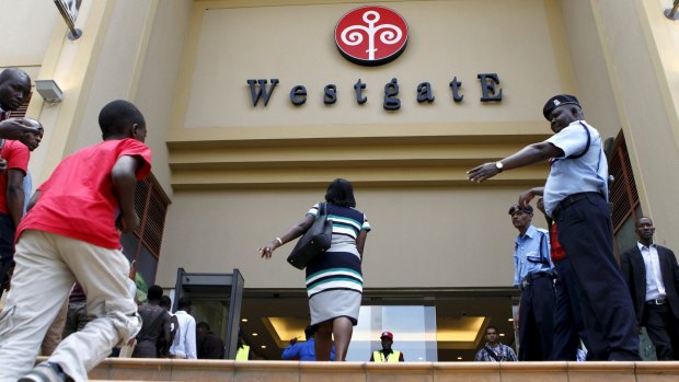 Customers enter the reopened Westgate shopping mall on Saturday.