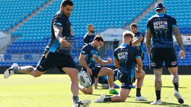 Sleeping giant: Andrew Fifita puts in the boot at Blues training.
