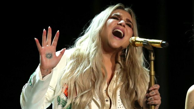 Kesha performs Praying at the Grammy Awards on Monday.