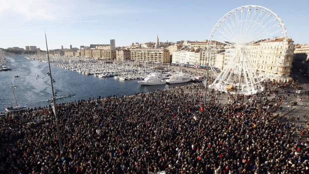 Thousands of people attend  a demonstration in solidarity with the victims of terrorist attacks in and around Paris linked to Wednesday's attack on French satirical newspaper Charlie Hebdo at the Old-Port of Marseille on Saturday.
