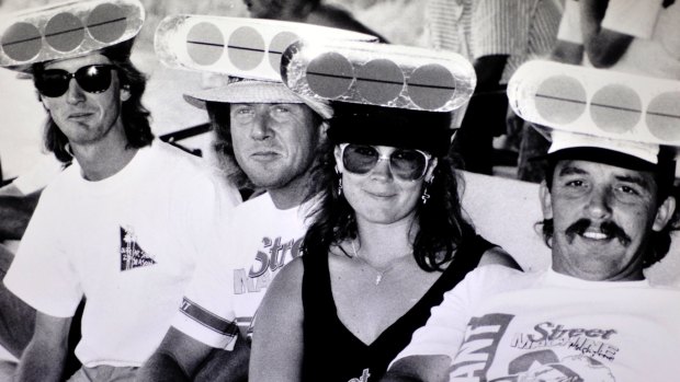 John Hoger, Gary Stewart, Emma Wilsonm and Brad Stewart wear matching hats in December 1988.