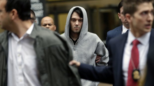 Martin Shkreli leaves court in New York after being charged with securities fraud.