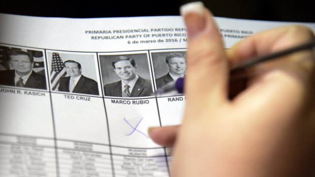 A woman marks her vote during the Florida primary in March.