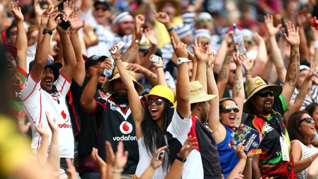 And the crowd goes wild: Fans enjoy the action during the 2015 Auckland Nines at Eden Park.