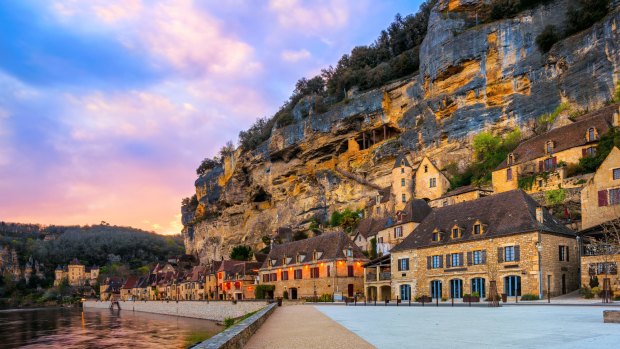 La Roque-Gageac, one of the most beautiful villages of France (Les Plus Beaux Villages), in dramatic sunset light. 