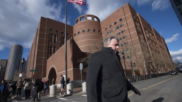 Former Boston Police Commissioner Ed Davis, who was in office at the time of the Boston Marathon bombings, leaves the federal courthouse on the first day of jury selection in the trial of accused bomber Dzhokhar Tsarnaev. 