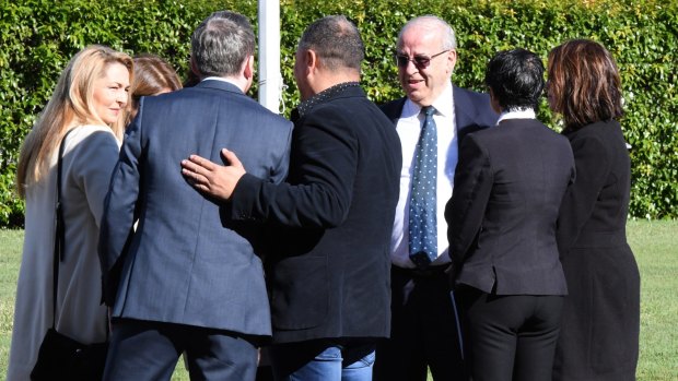 Eddie Obeid with members of his family and legal team during the trial.