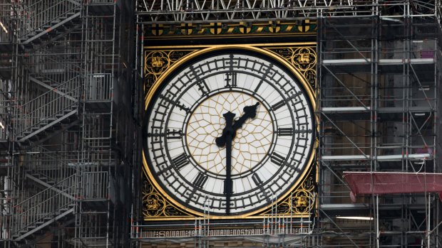Scaffolding surrounds the clock face on the Elizabeth Tower, also known as Big Ben.