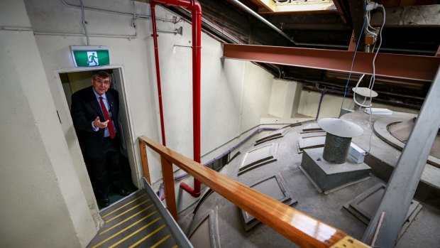 Parliamentary officer Peter Lochert over the library dome, near the cramped offices of 19 MPs.