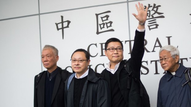 Released: Chu Yiu-ming, Benny Tai, original founder of the pro-democracy Occupy movement, Chan Kin-man and Chinese Cardinal of the Catholic Church and former bishop of Hong Kong, Joseph Zen, come out of the police station.