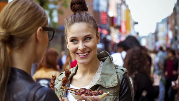 Look for popular vendors who cook the food in front of you. 