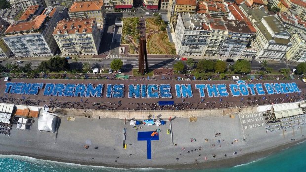 Tiens employees form the longest ever "human phrase", positioning themselves in groups that read "Tiens' dream is Nice in the Cote d'Azur".