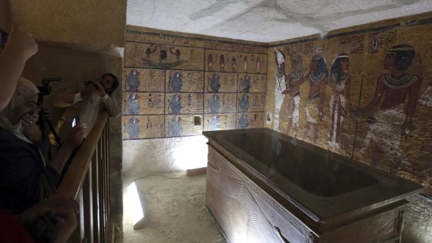 Foreign diplomats attend the inauguration of a replica of the Tutankhamun's tomb  in Luxor, Egypt in 2014. Could the real tomb have concealed a door all this time?