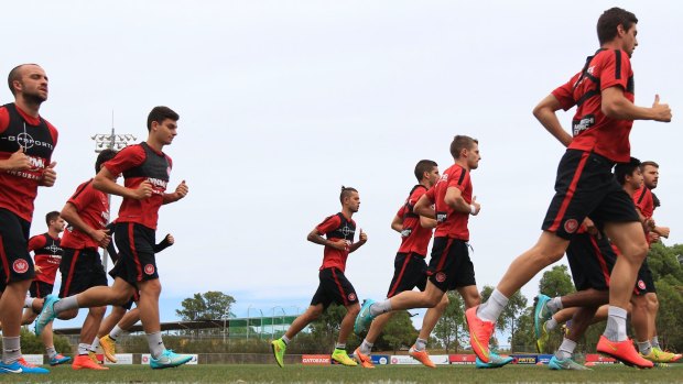 Running on empty: Wanderers go through their training paces on Tuesday. 