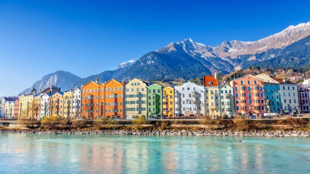 Innsbruck is surrounded by mountains.