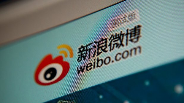 Outcry: Weibo users have criticised the selfies taken by hospital staff in operating theatres at a private Chinese hospital.