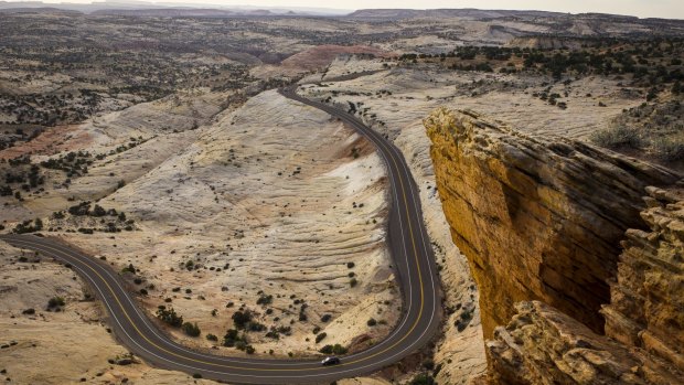 Sunrise along Scenic Byway12 between Escalante and Bolder, Utah. The byway is Utah's first All-American road. It spans 124 miles from near Panguitch in the west through some of the most desolate and beautiful mountain desert of southern Utah, ending at Torrey in the east. 