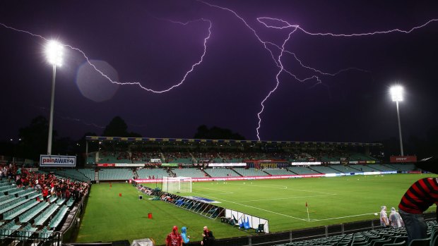 Hoping lightning strikes twice: The storm at Pirtek Stadium on Wednesday night before the Wanderers win over Melbourne City.