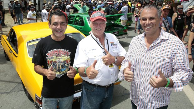 Summernats co-owner Andy Lopez, left, event founder Chic Henry and Northern Territory Chief Minister Adam Giles among the crowd at Exhibition Park on Sunday.