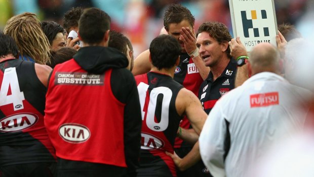James Hird with his team during the round one clash with Sydney.