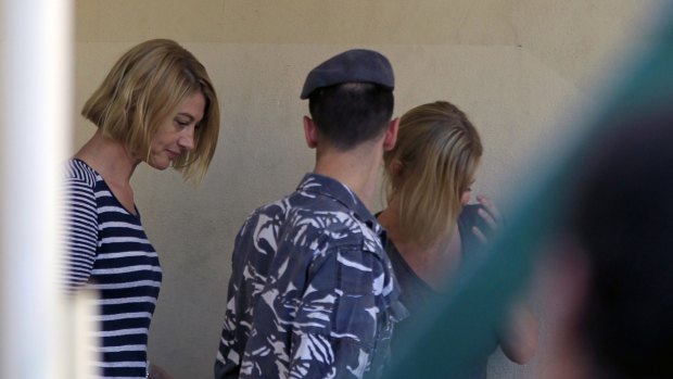 Tara Brown, left, and Sally Faulkner leave a women's prison in Beirut.