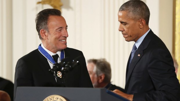 President Barack Obama presents the Presidential Medal of Freedom to Bruce Springsteen in November 2016.
