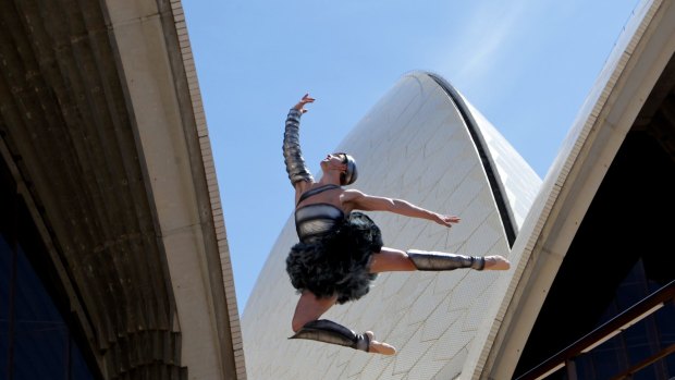 Christopher Rodgers-Wilson, winner of the 2013 Telstra Ballet Dancer Award, leaps up in front of the Opera House.  