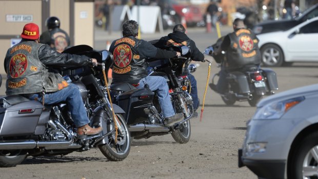 People ride motorcycles at the National Western Complex, in Denver on Saturday. 