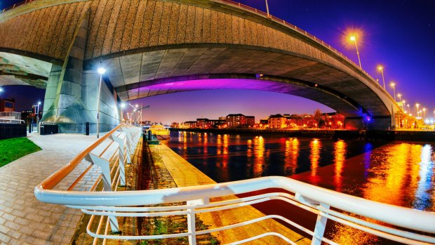 View from below the Kingston Bridge carrying the M8 motorway over the River Clyde in Glasgow, Scotland.