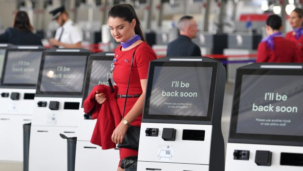Virgin Australia employees at Sydney Airport on Tuesday.