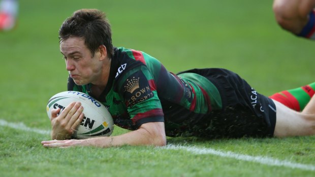 Sliding in: Souths playmaker Luke Keary is in the sights of the Dragons.