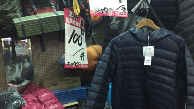 Oone stall has a Uniqlo down jacket for just 100 yuan ($21.60), some five times below recommended retail. Upon closer inspection, though, it is a (fairly decent) knock-off.