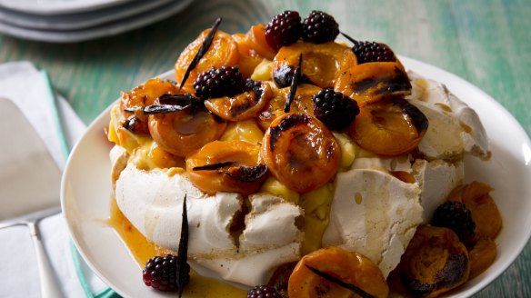 Karen Martini's pavlova is dressed up with roasted apricots, vanilla, blackberries and tangy lemon curd <a href="http://www.goodfood.com.au/recipes/pavlova-with-roasted-apricots-vanilla-blackberries-and-lemon-curd-20140211-32fbl"><b>(Recipe here).</b></a>