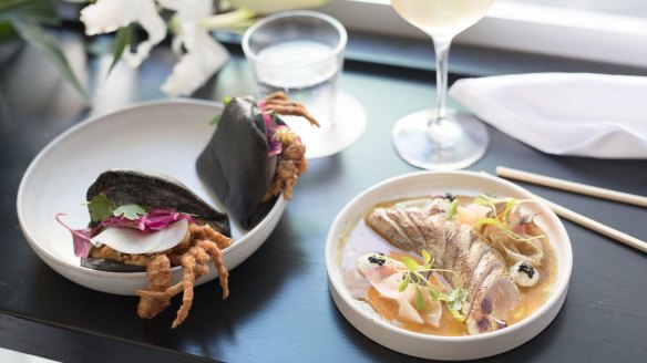 Clean Scandi/Jap vignette: Black bun with deep-fried soft-shell crab (left) and bonito pastrami.